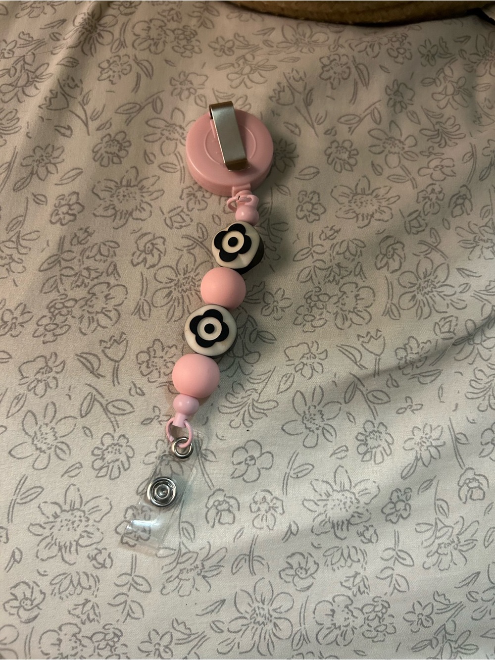 Badge reel pink and black and white flowers!